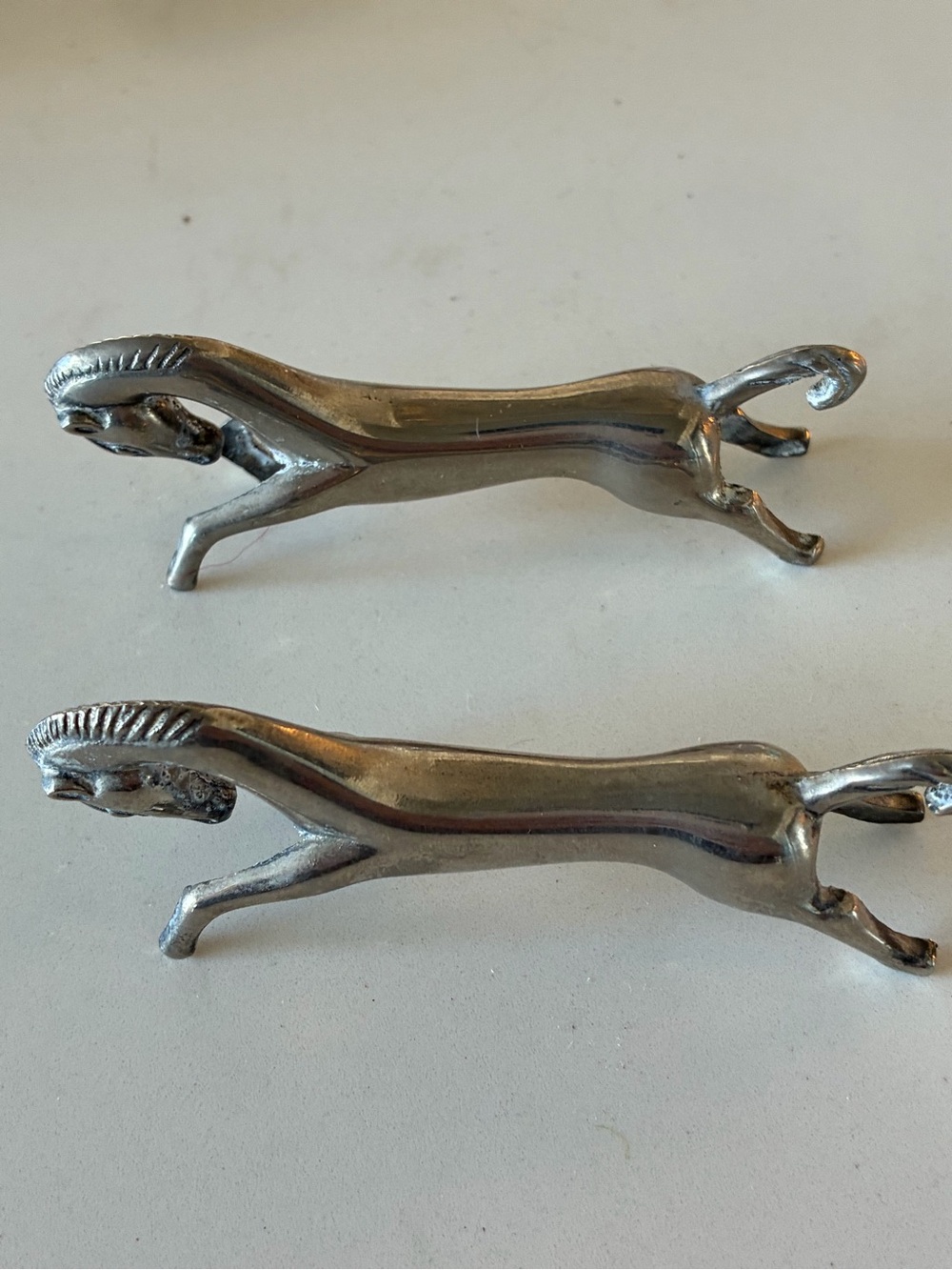 Vintage silver-plated horse knife rests (repose-couteaux).